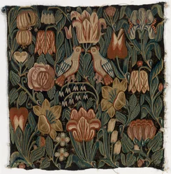 Tapahtunut tyynynpäällinen, joka kuvaa kahta lintua kukkien keskellä, valmistettu Schleswig-Holsteinissa, Tanskassa, n. 1690 (villa)