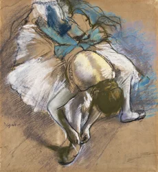 Tanssijatar pukemassa kenkäänsä, noin 1880-1885