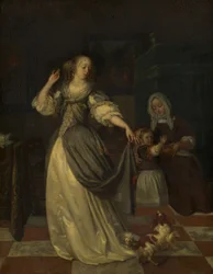 Lady leikkii koiran kanssa
