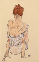 Istuva nainen alusvaatteissa takaapäin, 1917