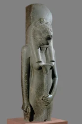 Sekhmet-jumalatar, jolla on papyruksen varren muotoinen valtikka ...