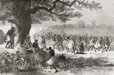 Henry Morton Stanley katselee Vouagogos-heimon valmistautumista taisteluun hänen tutkimusmatkansa aikana vuonna 1871, kuvitus teoksesta "The World in the Hands", julkaistu 1878