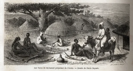 Norsunluuvalmistelu turkkilaiselle kauppiaalle, Uganda, Emile Bayardin (1837-1891) piirros, joka havainnollistaa kapteeni Speken löytömatkaa Afrikassa vuosina 1860-1863. Kaiverrus kirjaan "" Le tour du monde", toimittanut Edouard Charton