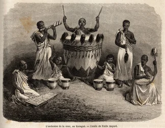 Hoviorkesteri Karaguessa (Victoria-järven länsipuolella, nykyinen Zimbabwe), Emile Bayardin (1837-1891) piirustus kuvaa kapteeni Speken löytömatkaa Afrikassa vuosina 1860-1863. Kaiverrus "" Le tour du monde ””, editoi Edouard Char