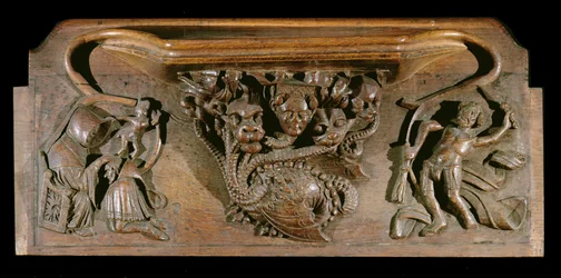 Kurjuusormitus, joka kuvaa taidokkaasti veistettyä hydraa, joka symboloi seitsemää kuolemansyntiä ja jossa on realistinen ihmispää, New College Chapel, Oxford, 1300-luvun loppu (puuta)