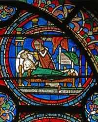 Yksityiskohta Miracle Window -ikkunasta, jossa St. Thomas vierailee sairaan miehen luona unissaan
