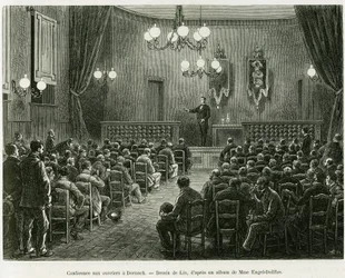 Konferenssi Dollfus Mieg -työpajojen työntekijöille Dornachissa. Lixin kaiverrus havainnollistamaan tarinaa Elsassin ja Lorrainen läpi, Charles Grad, saksalainen deputer, vuonna 1885, tour du monde 1886, ohjaaja Edouard Charton (1807-1890), Hache