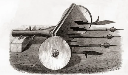 Ribauldequin, helvetin kone- tai urkuase, aseistettu pienillä tykillä ja haukeilla, Les Merveilles de la Sciencesta, julkaistu n. 1870 (kaiverrus)