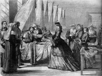 Itävallan ja Preussin sota (1866): Itävallan keisarinna Elisabeth (Sissi) (1837-1898) vierailee haavoittuneiden sotilaiden luona Wienissä. Kaiverrus "" Le Monde Illustré" -julkaisussa nro 486, 4. elokuuta
