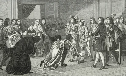 Ludvig XIV (1638-1715) aurinkokuningas esittelee pojanpoikansa Philippe V:n (1683-1746) Espanjan lähettiläille Colartin teoksesta "Histoire de France", julkaistu noin 1840.