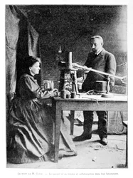 Pierre (1859-1906) ja Marie (1867-1934) Curie laboratoriossaan