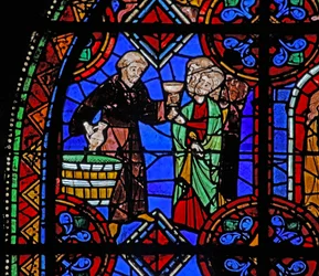 Ikkuna w06, joka kuvaa pyhiinvaeltajia St Julian of Briouden haudalla, jossa jaetaan viiniä