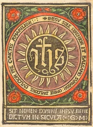 Monogrammi JHS liekeissä