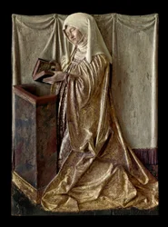 Polvistuva luovuttaja Fragmentti kaiverretusta alttaritaulusta moniväriseen puuhun. Swabiasta. 1520 noin Pariisi, Louvre-museo