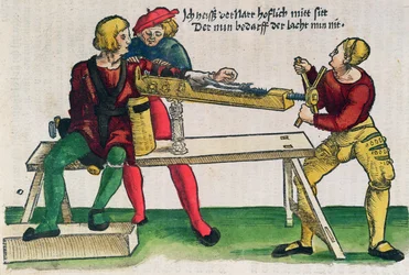 Laite käsivarren murtumien parantamiseen, kuva Hans von Gersdorffin teoksesta "Feldtbuch der Wundartzney", n. 1540 (värillinen puupiirros)