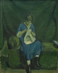 Nuori tyttö ompelee