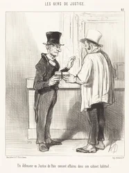 Puolustusasianajaja... keskustelemassa... tavanomaisessa työhuoneessaan
