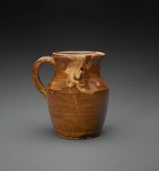 Kannu, n. 1889-1900 (liukuglasitettua kivitavaraa).