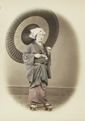 Japanilainen nainen sateenvarjolla (käsinvärinen mustavalkokuva)