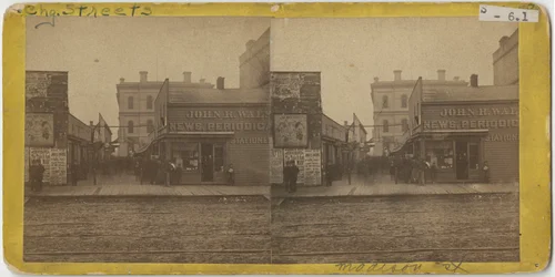 Näkymä John R. Walsh Periodicals -myymälästä Madison Streetillä Chicagossa postitoimiston taustalla, 1869