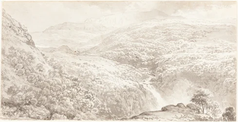 Una vall de muntanya amb una cascada finlandesa
