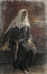 Istuva nainen