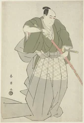 Momonoi Wakasanosuke piirtää miekan Momonoi Wakasanosuke vetää toisen kahdesta miekastaan