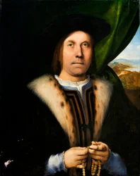Muotokuva miehestä, jolla on rukousnauha, noin 1520 (öljy paneelille).