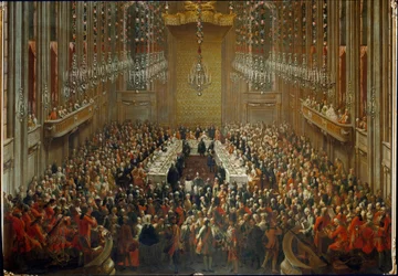 Juhlatilaisuus keisari Joseph II:n ja Isabellan Parman häiden yhteydessä 6.10.1760. Mozart seisoo orkesterissa