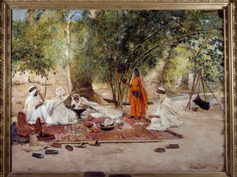 Orientalismi: "" Vieraanvaraisuuden ateria"" Arabielämän kohtaus Chelman keidassa lähellä Biskraa, Algeriassa. Maurice Bompardin (1857-1936) maalaus 1891 Marseille, Musee des Beaux Arts