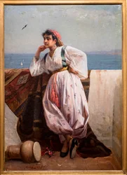 Nuori itämainen tyttö terassilla Algerissa