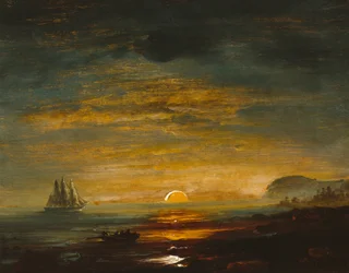 Rannikkomaisema auringonlaskulla