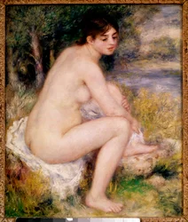 Alaston nainen maisemassa. Pierre-Auguste Renoirin (1841-1919) maalaus, 1883. Pariisi, Musée d