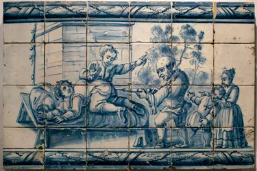 Lääkäri antaa potilaalle peräruiskeen - Satiirinen paneeli Lissabonista, 1700-luvun alkupuoli (Lääkäri - Satiirinen paneeli, 1700-luvun alkupuoli) - Kansallinen azulejo-museo, Lissabon (Portugali)