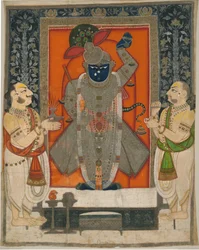 Papit, jotka palvovat Krishnaa Shrinathjina ruoanvuoren juhliin [Annakuta utsava]; pyhäkkö roikkuu [pichhavai]
