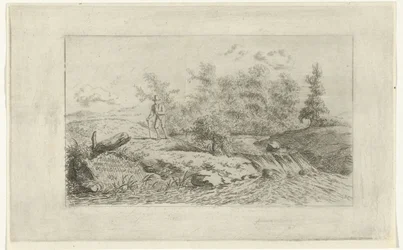 Mies vesiputouksella