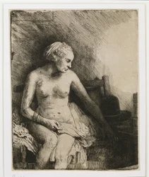 Nainen kylvyssä hattu vieressä, 1658