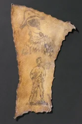 Ihmisen iho, tatuoitu arlekiini ja Simsonin hahmo, ranska