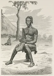Azandehin tai Nyam-Nyamsin harppusoitin, prof. Friedrich Ratzelin teoksesta "Ihmiskunnan historia", pub. vuonna 1904