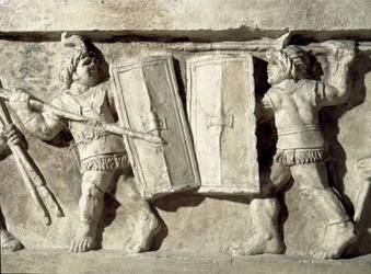 Roomalainen taide: matala reliefi, joka edustaa gladiaattorien taistelua. 1. vuosisadalla jKr. Rooma, Museo della Civilta Romana