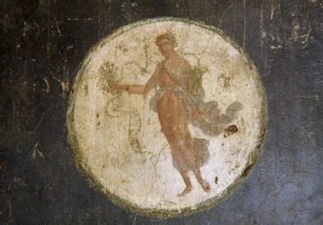 Fresko medaljongilla, oikea siipi House of Vettii -rakennuksessa Pompejissa (UNESCOn maailmanperintöluettelo)