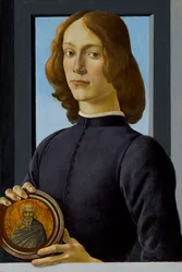 Nuori mies pitelee pyöreää kättä, n. 1480.