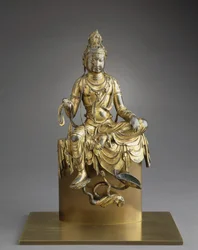 Istuva Bodhisattva Avalokitesvara, 8. vuosisata (pronssi ja kultaus).