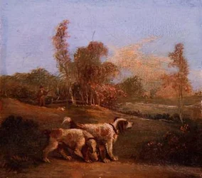 Spanielit maisemassa pitäjän kanssa