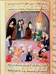 Profeetta Muhammed (Mohammed tai Muhammad) (570-632) (kasvot peitettyinä) matkalla Syyriaan, missä kristityt munkit ottavat hänet vastaan ja tarjoavat hänelle 1700-luvun turkkilaisen miniatyyriaterian. Topkapı-museo, Istanbul, Turkki