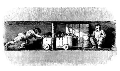 Poika työntää hiilellä lastattua kuorma-autoa kivihiilen pinnasta kaivon pohjaan, c1848