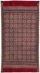 Seremoniakangas ja pyhä perintökukka (sembagi), jossa on "loputon solmu" -aihe.