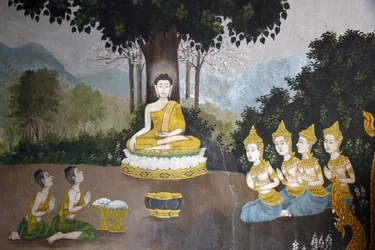 Fresko, joka kuvaa kohtausta Buddhan elämästä Wat Phra Doi Suthepissa Chiang Maissa. Buddha saa almua. Thaimaa