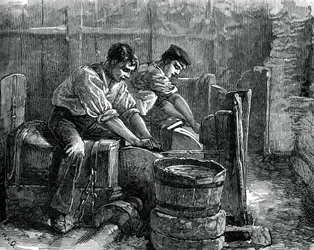Hiomakoneet työssä pyörän päällä, c1880