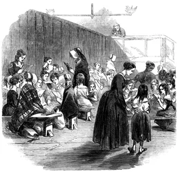 Opettaa tyttöjä lukemaan Ragged School Union -koulussa, Lambeth, Lontoo, 1868